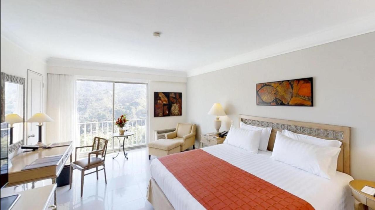 Hotel Estelar Altamira Ibague Exterior photo A room at the hotel
