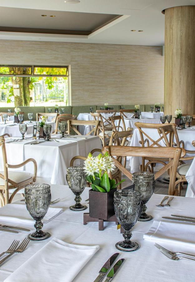 Hotel Estelar Altamira Ibague Exterior photo The interior of the restaurant