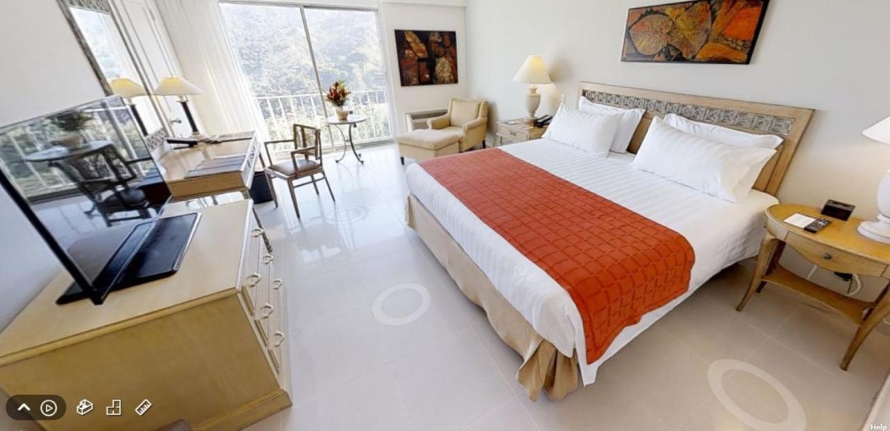 Hotel Estelar Altamira Ibague Exterior photo A room at the hotel