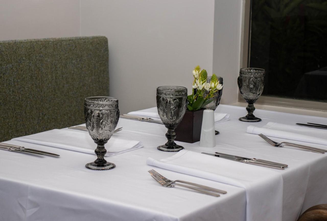 Hotel Estelar Altamira Ibague Exterior photo A table set for a meal