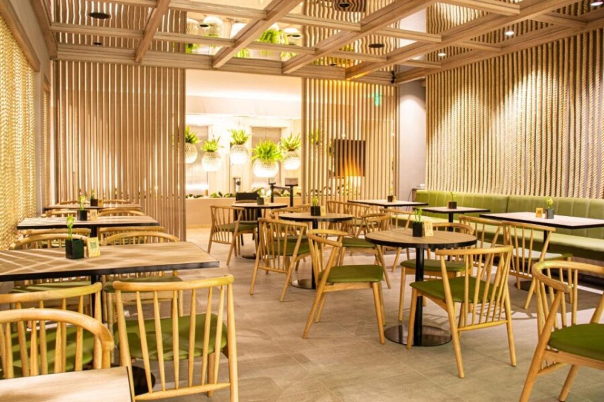 Hotel Estelar Altamira Ibague Exterior photo Interior of a restaurant in Japan